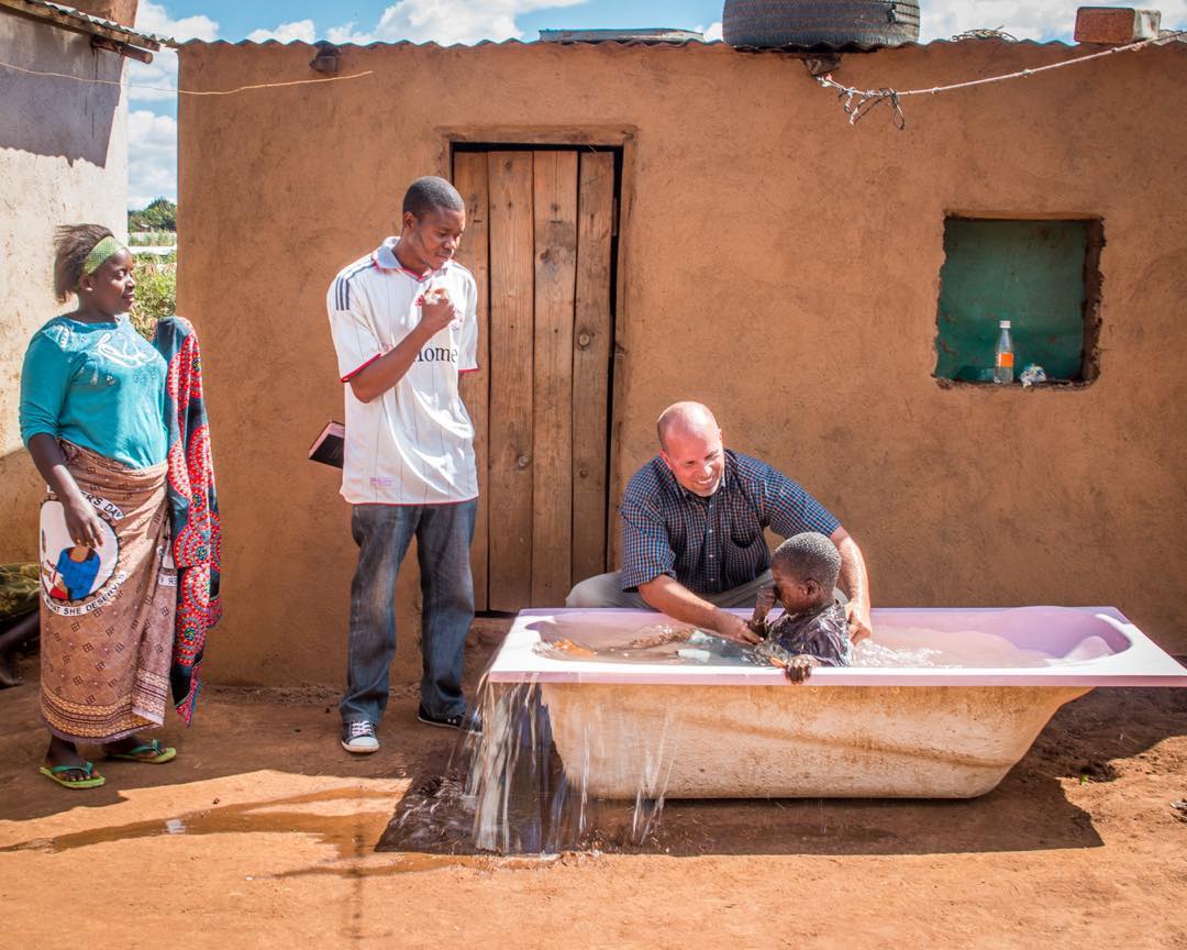 Baptism in temporary baptismal in Africa
