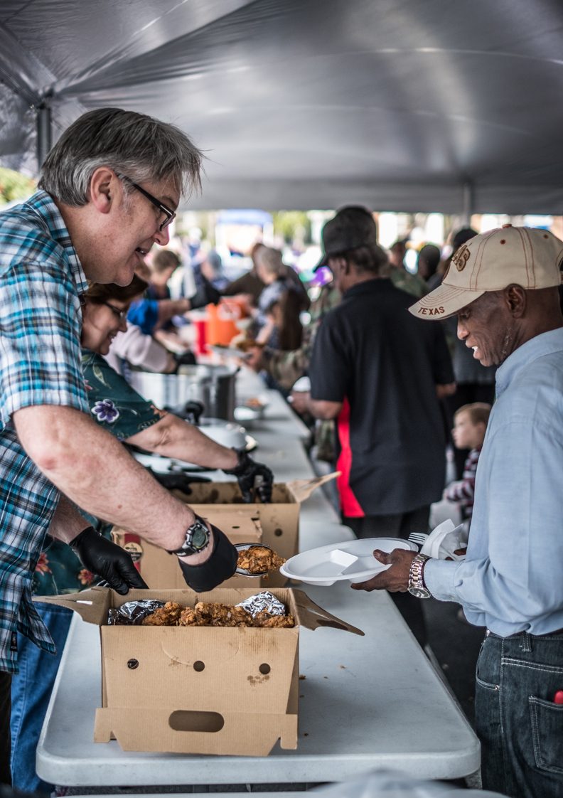 One of our shepherds serving food at Day of H.O.P.E. 2017
