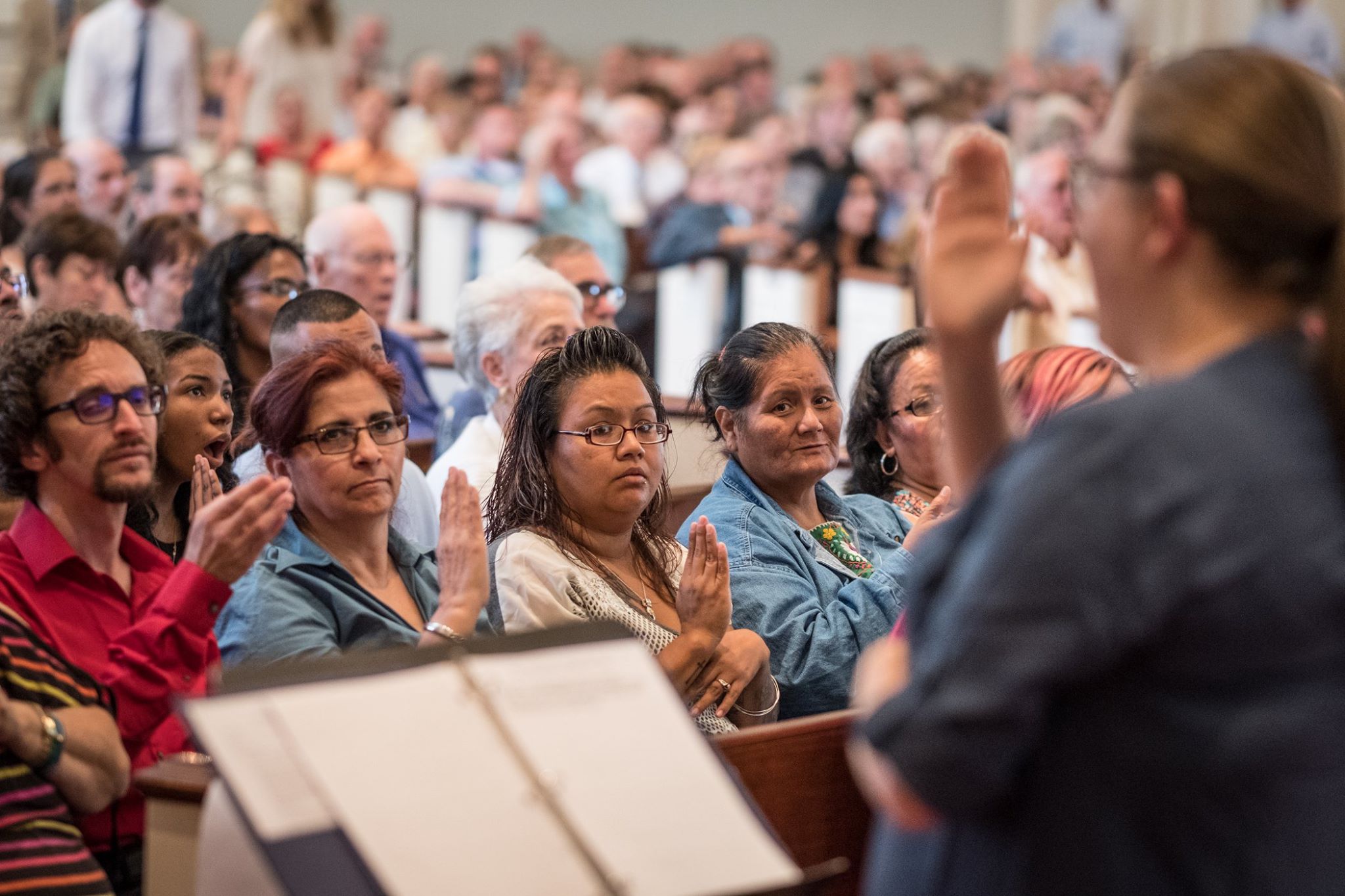 The deaf and hard-of-hearing ministry signing worship together