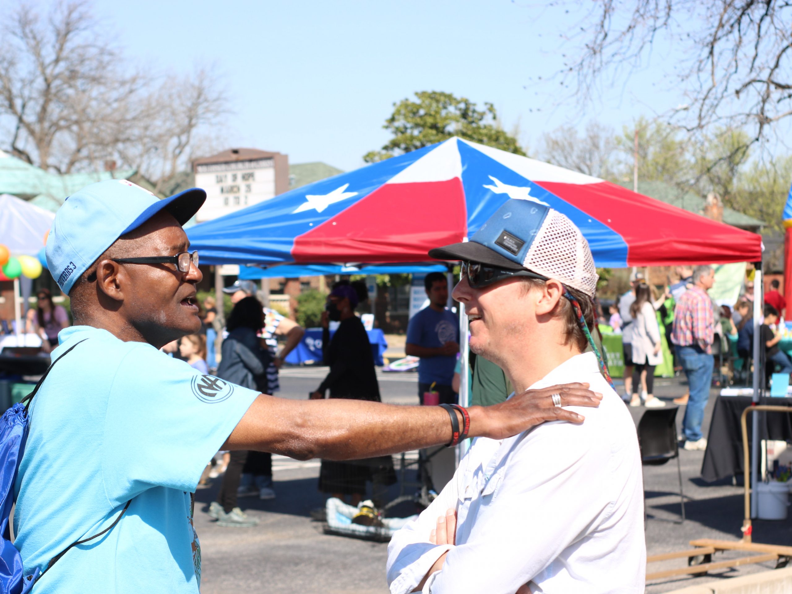 Two Southside guys embrace, celebrating hope and recovery at Day of Hope 2022