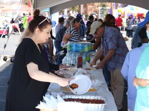 A Southside lady serving food at Day of Hope 2022